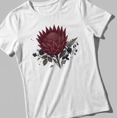 Dark burgundy and green King Protea flower illustration on a gothic — printed on a women's shirt