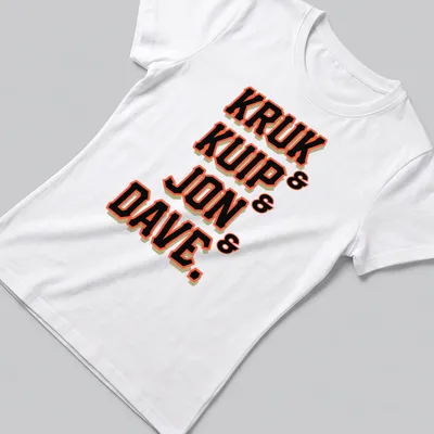 Bold collegiate graphic with the names Kruk, Kuip, Jon, and Dave in black, orange, and white. — printed on a women's shirt