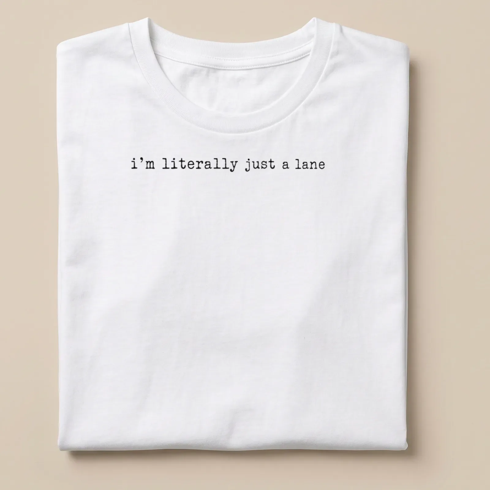Simple text design with black lettering that reads 'I'm literally just a lane' on a white — printed on a unisex t-shirt