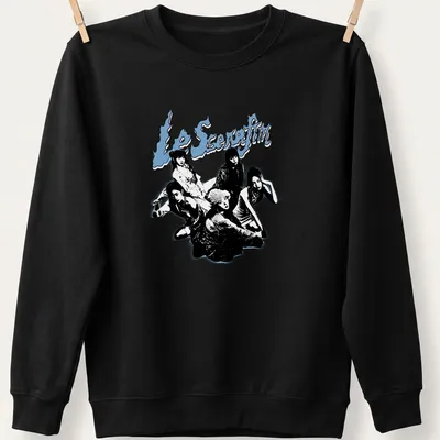 Bold graphic tee featuring Le Sserafim K-pop group name in black, blue, and white — printed on a unisex sweatshirt