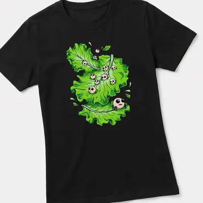 Cartoonish Halloween t-shirt featuring green lettuce with funny parasites. — printed on a women's shirt