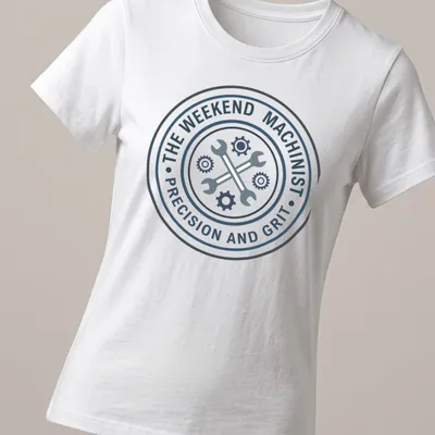 Badge design with wrenches and text for weekend machinists in blue, white, and black — printed on a women's shirt