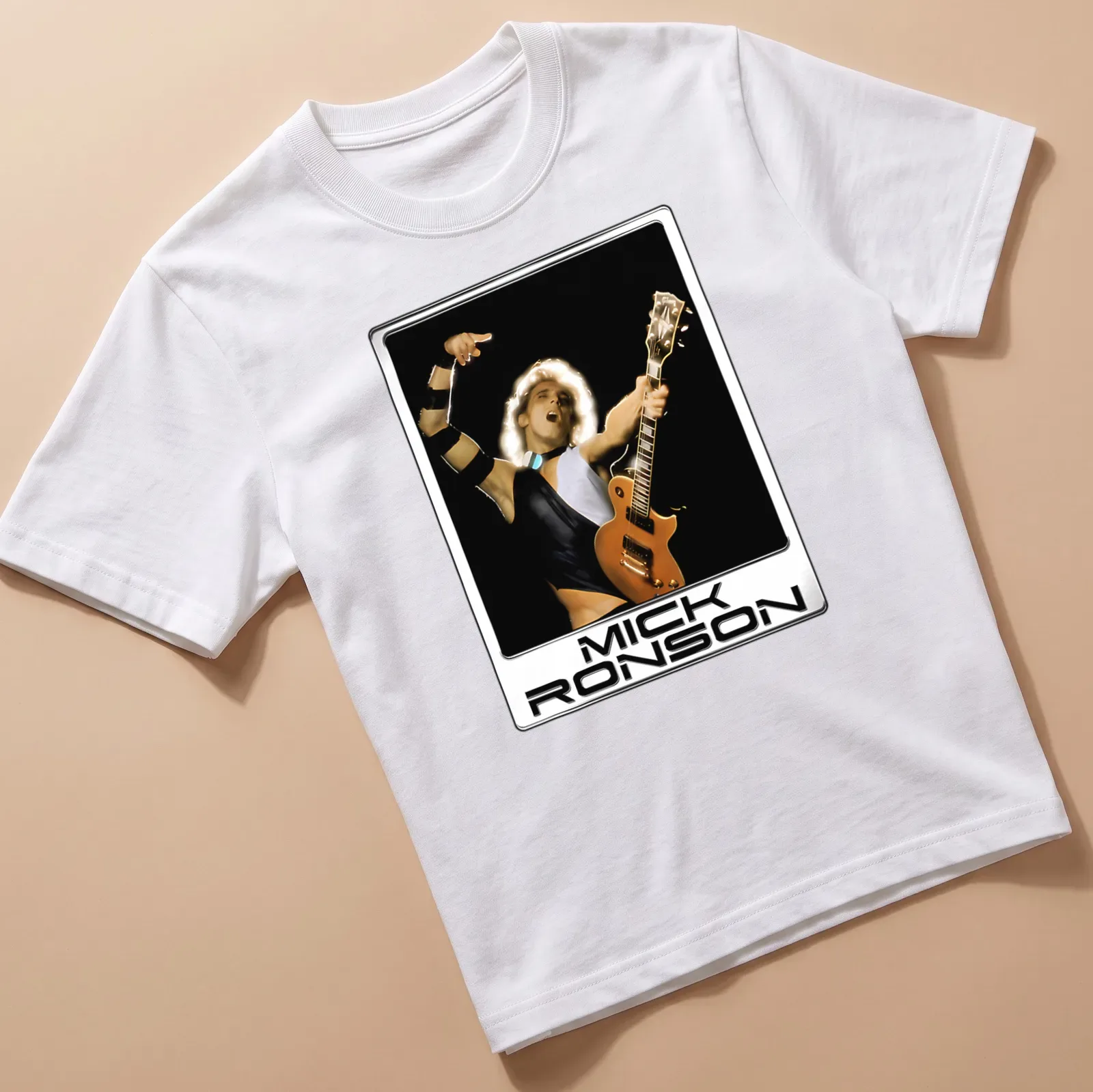 Vintage-style Mick Ronson shirt featuring a rock musician playing guitar — printed on a unisex t-shirt