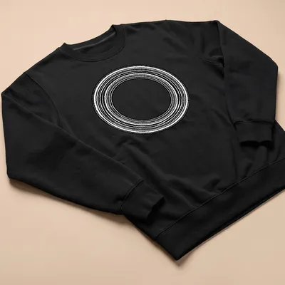 Minimalist design featuring concentric rings in black and white — printed on a unisex sweatshirt