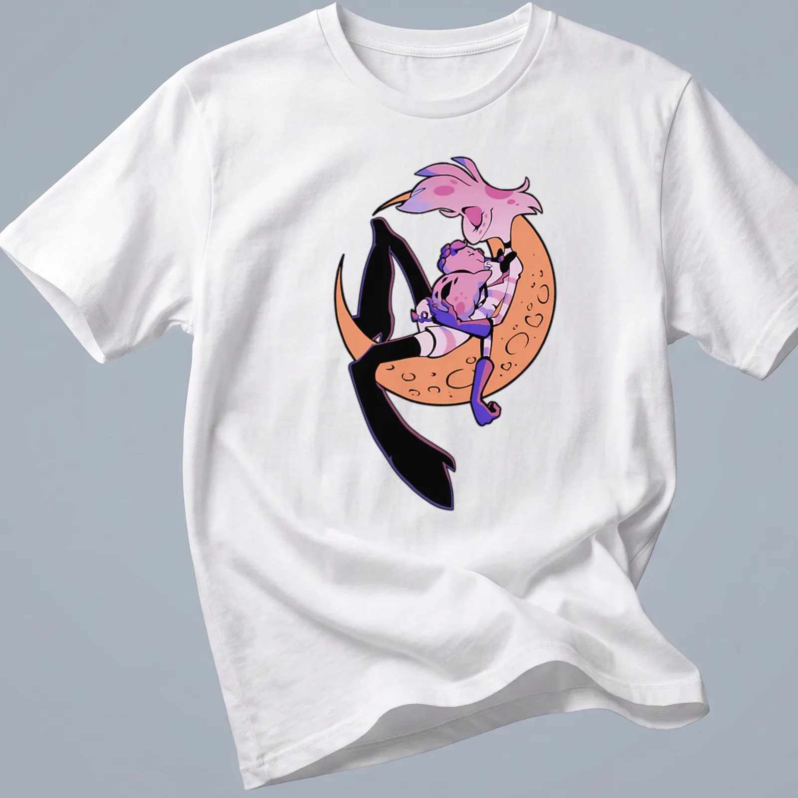 Cartoon style t-shirt featuring cute characters on a crescent moon in pink, orange, black, and purple. — printed on a unisex t-shirt