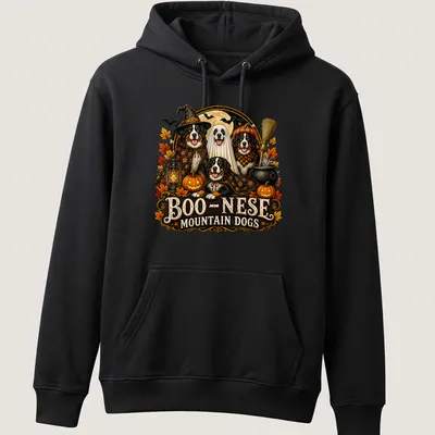 Vintage Halloween design featuring mountain dogs with spooky elements — printed on a unisex hoodie