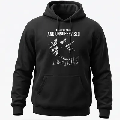 Vintage distressed tee featuring mountains and the phrase Retired And Unsupervised — printed on a unisex hoodie