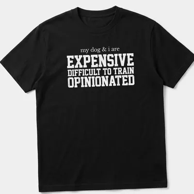 Bold typography t-shirt featuring humorous text about dogs and training.