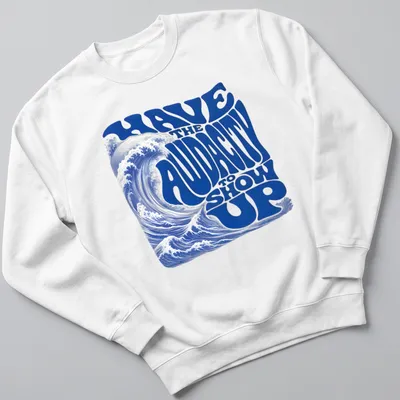 Retro wave design featuring an ocean wave and bold motivational text. — printed on a unisex sweatshirt