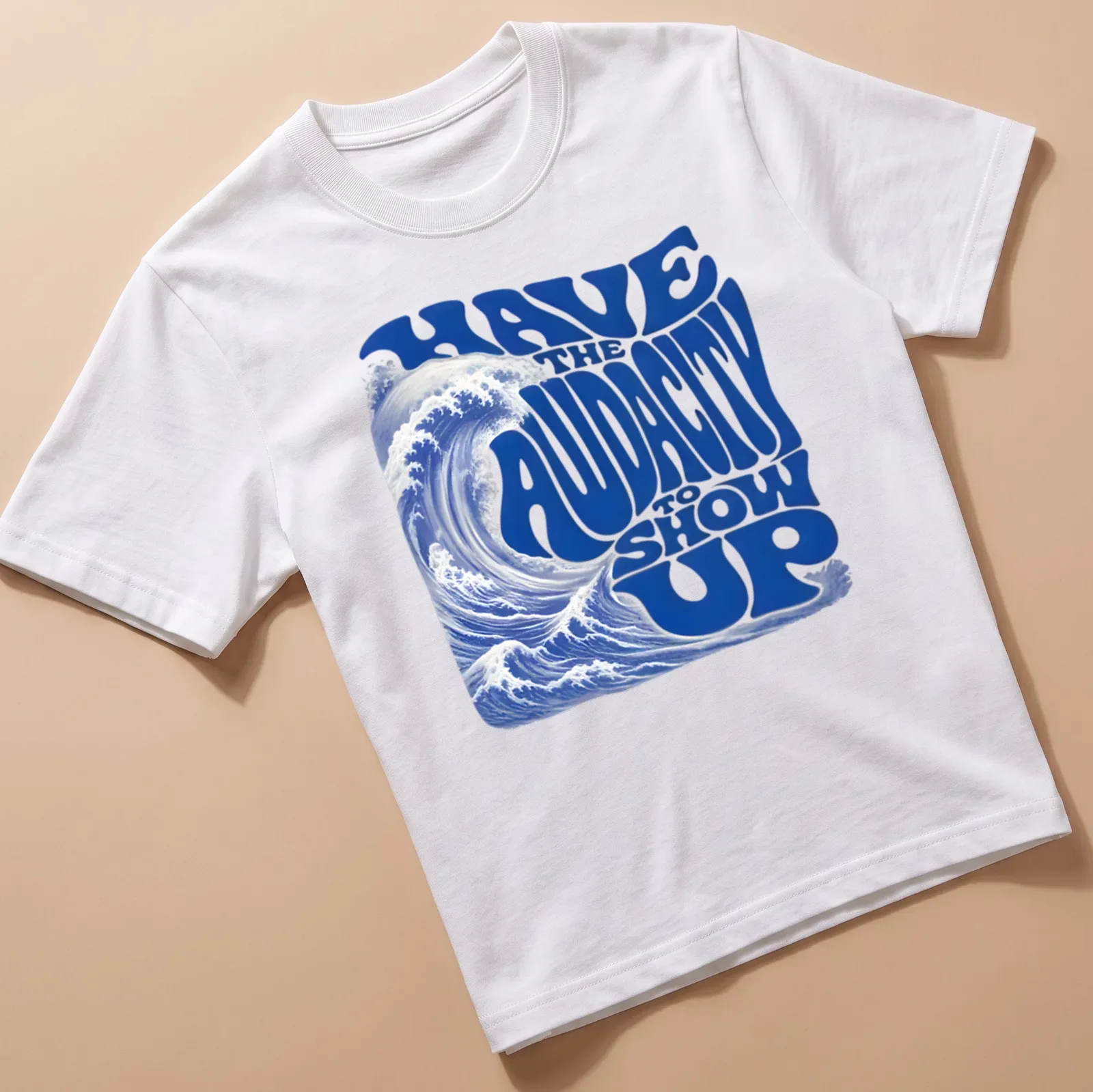 Retro wave design featuring an ocean wave and bold motivational text. — printed on a unisex t-shirt
