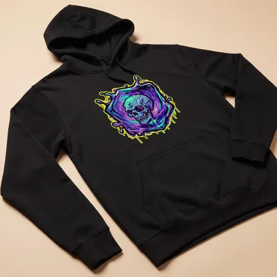 Graffiti style illustration of a skull in purple, cyan, yellow, green, and black — printed on a unisex hoodie