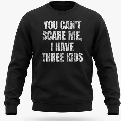 Vintage distressed tee with humorous text about parenting three kids — printed on a unisex sweatshirt