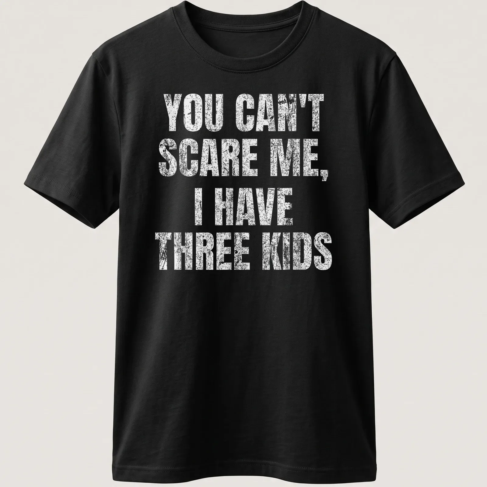 Vintage distressed tee with humorous text about parenting three kids — printed on a unisex t-shirt