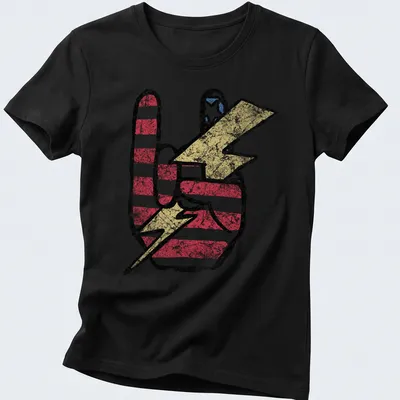Distressed graphic of a peace sign in a lightning bolt with American flag colors — printed on a women's shirt