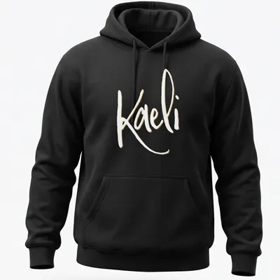 Elegant script personalized name T-shirt featuring 'Kaeli' in gold and white — printed on a unisex hoodie