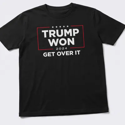 Bold political statement t-shirt with text: Trump Won Get Over It in red, white, and blue