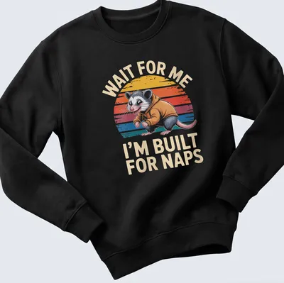 Vintage retro t-shirt featuring a possum and the phrase about naps in bright colors. — printed on a unisex sweatshirt