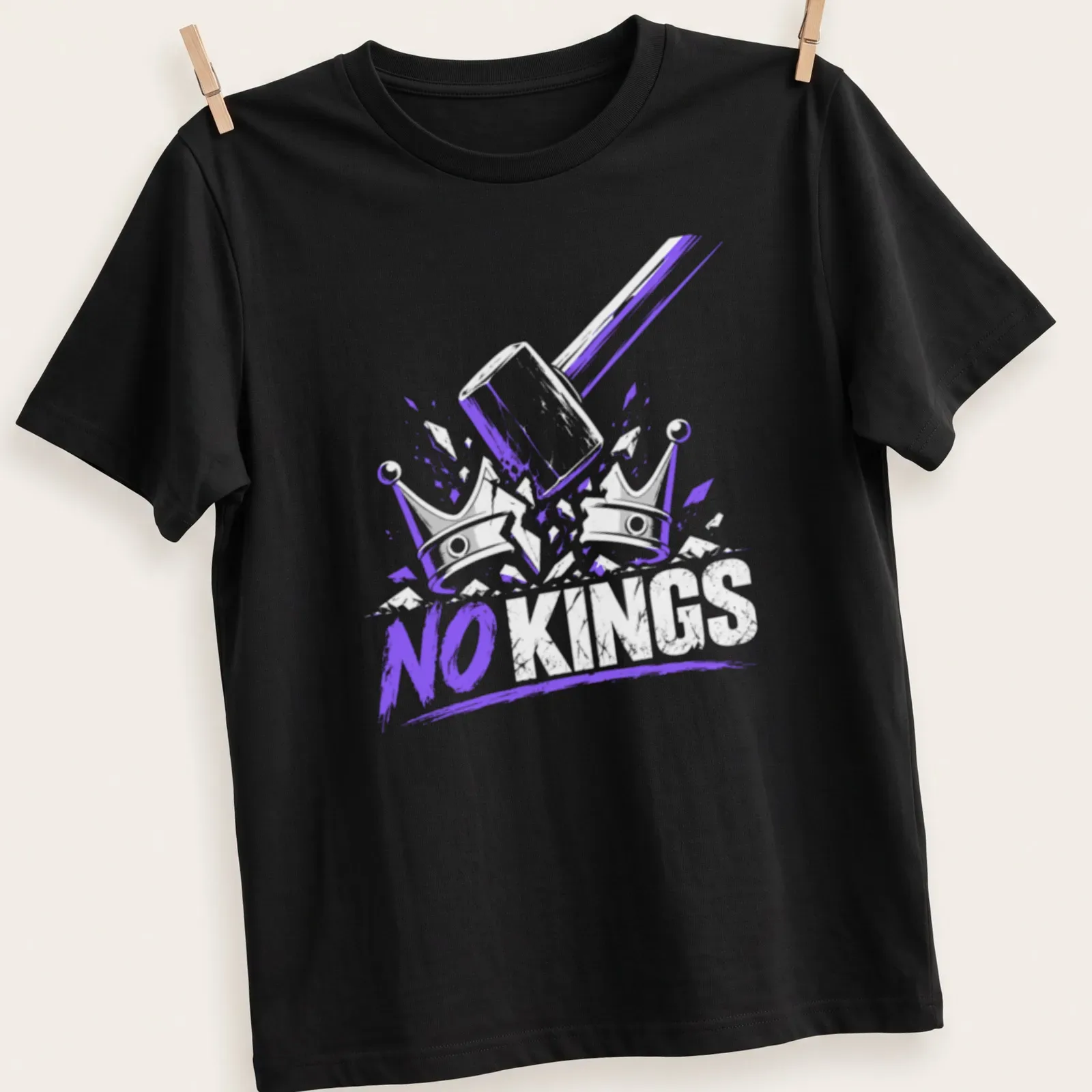 Bold 'NO KINGS' graphic featuring a gavel and crowns in purple and white. — printed on a unisex t-shirt