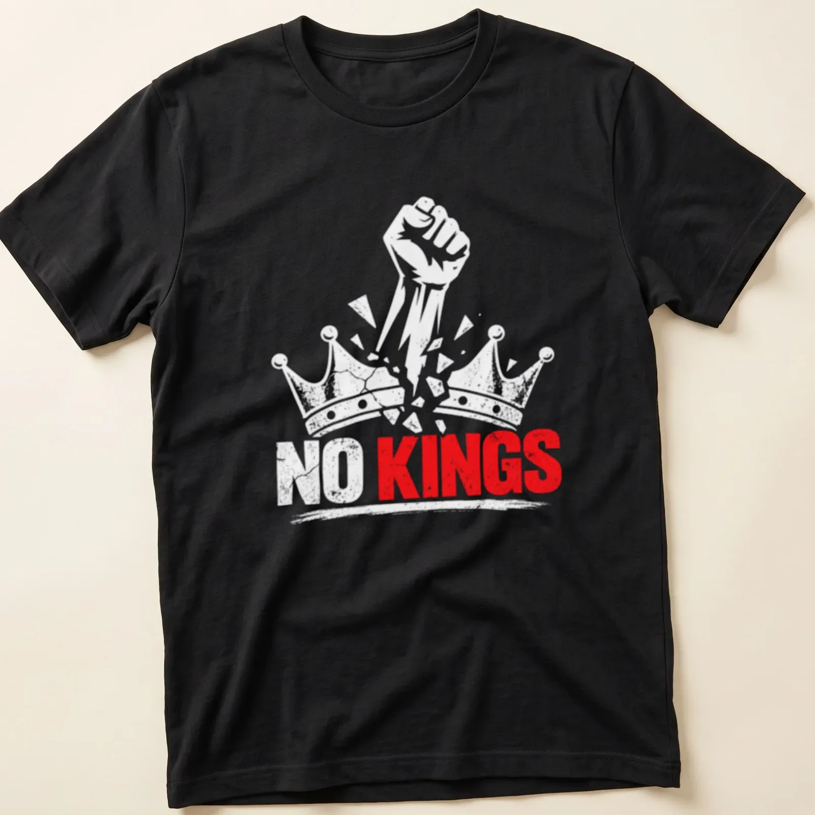 Distressed print of a raised fist with 'NO KINGS' text in red and white — printed on a unisex t-shirt