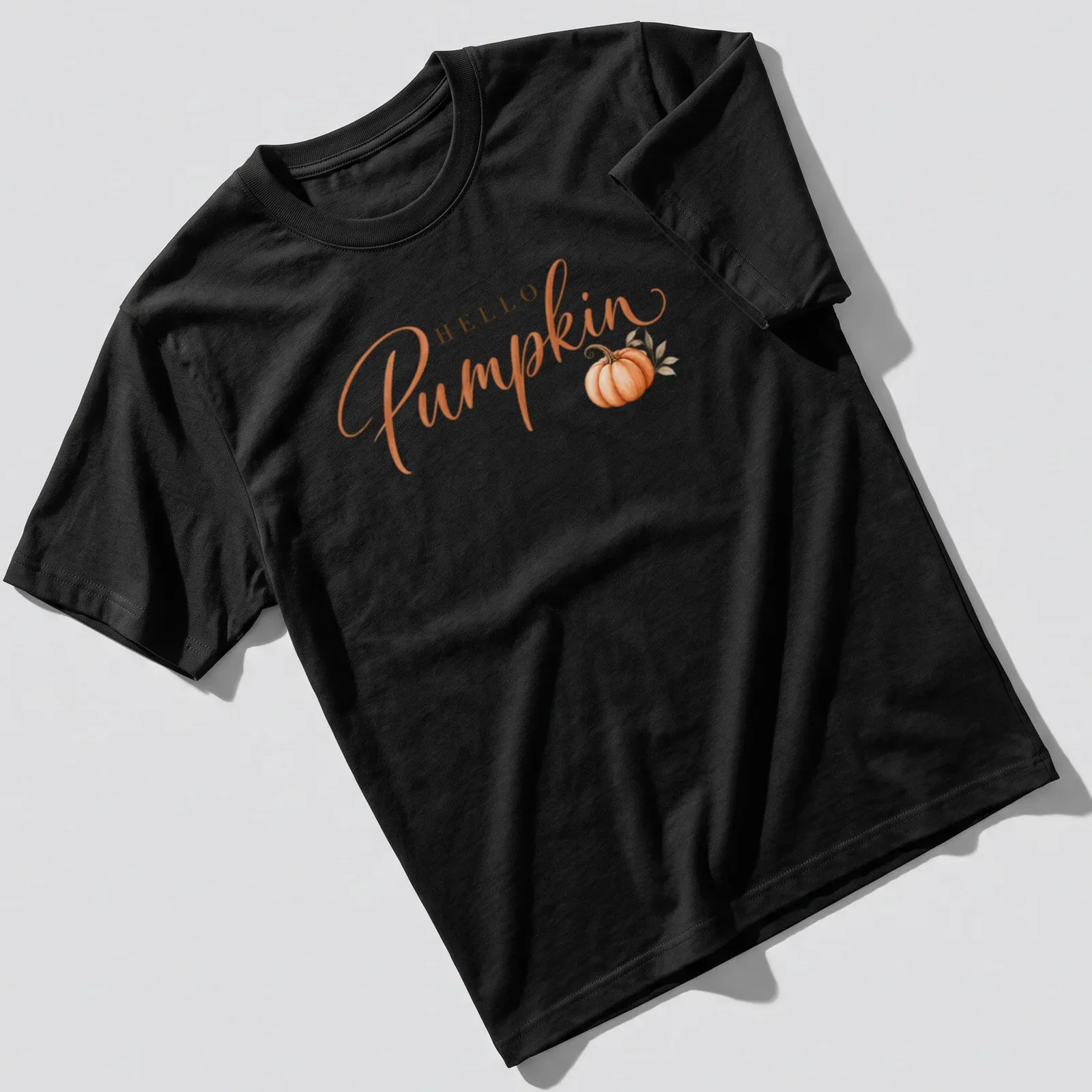Elegant script T-shirt with 'HELLO Pumpkin' and a pumpkin illustration — printed on a unisex t-shirt