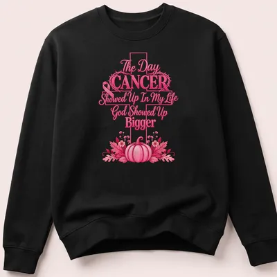 Vibrant floral design with pumpkins and the phrase about cancer and faith. — printed on a unisex sweatshirt