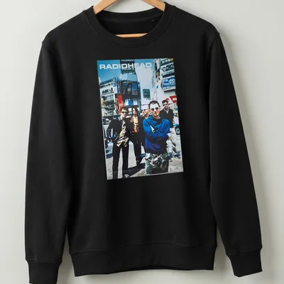 Vintage Radiohead band photo t-shirt in blue, black, white, and grey — printed on a unisex sweatshirt