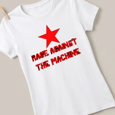 Bold distressed RAGE AGAINST THE MACHINE text with a red star design — printed on a women's shirt
