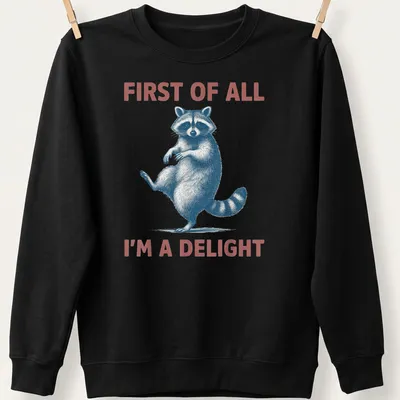 Vintage illustrated sassy raccoon with the text 'First Of All I'm A Delight' — printed on a unisex sweatshirt
