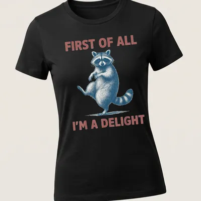 Vintage illustrated sassy raccoon with the text 'First Of All I'm A Delight' — printed on a women's shirt