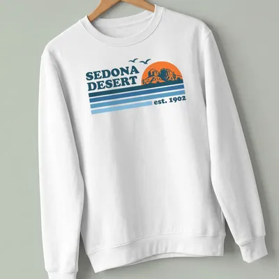 Vintage retro Sedona Desert T-shirt with mountains and cacti in orange and blue — printed on a unisex sweatshirt