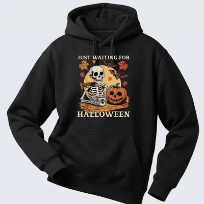Funny cartoon skeleton holding a pumpkin and coffee, waiting for Halloween — printed on a unisex hoodie