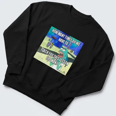 SpongeBob SquarePants shirt featuring text about teaching lessons in colorful cartoon style — printed on a unisex sweatshirt