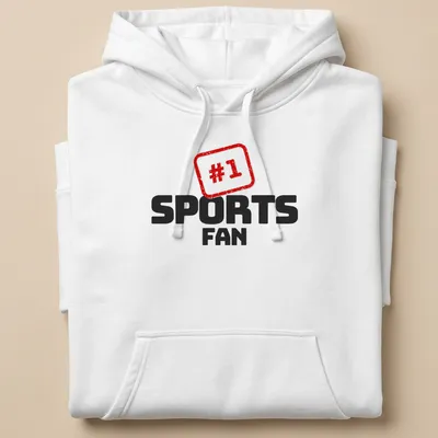Bold graphic t-shirt with #1 SPORTS FAN text in red, black, and white — printed on a unisex hoodie