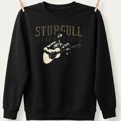 Vintage graphic of Sturgill Simpson playing guitar with distressed text — printed on a unisex sweatshirt