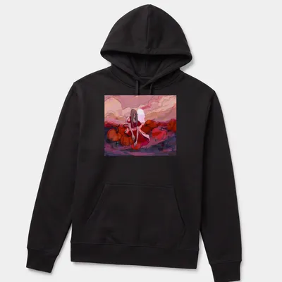 Surreal illustration of a girl in a red dress surrounded by pumpkins in a colorful field — printed on a unisex hoodie