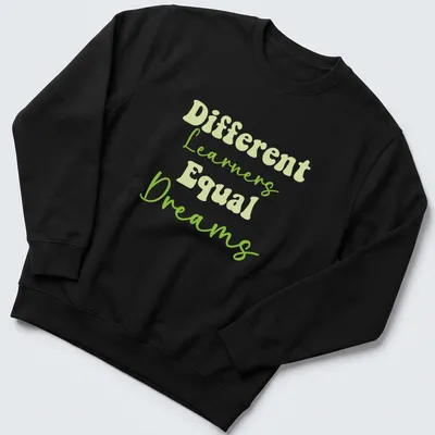 Playful script t-shirt with 'Different Learners Equal Dreams' for teachers — printed on a unisex sweatshirt