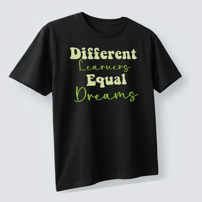 Playful script t-shirt with 'Different Learners Equal Dreams' for teachers — printed on a unisex t-shirt (angled view)
