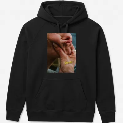 Photographic tee featuring a hand holding a thoughtful face with text "The Invite" above. — printed on a unisex hoodie