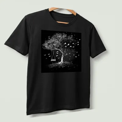 Black and white illustration of a tree with a swing and flying birds. — printed on a unisex t-shirt (angled view)