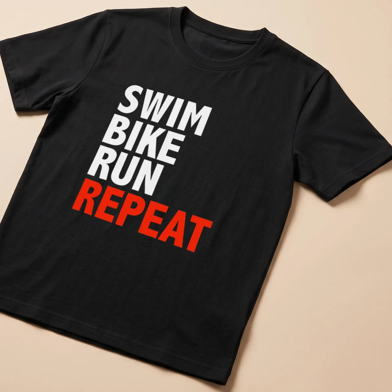 Bold typography t-shirt featuring the word REPEAT, representing triathlon training. — printed on a unisex t-shirt