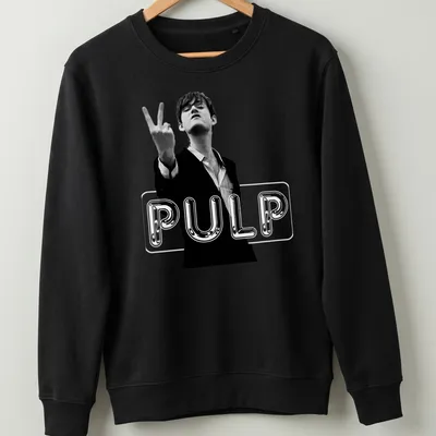 Black and white graphic of a man in a suit making a victory sign with PULP text — printed on a unisex sweatshirt