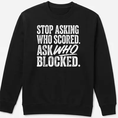 Bold typography t-shirt featuring volleyball humor about blocking and scoring — printed on a unisex sweatshirt