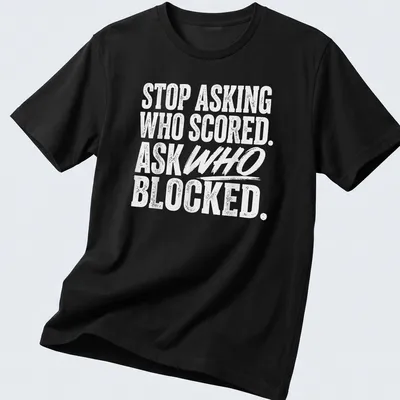 Bold typography t-shirt featuring volleyball humor about blocking and scoring