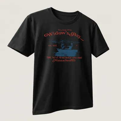 Vintage postcard style t-shirt with a rowboat scene and greetings text — printed on a unisex t-shirt (angled view)