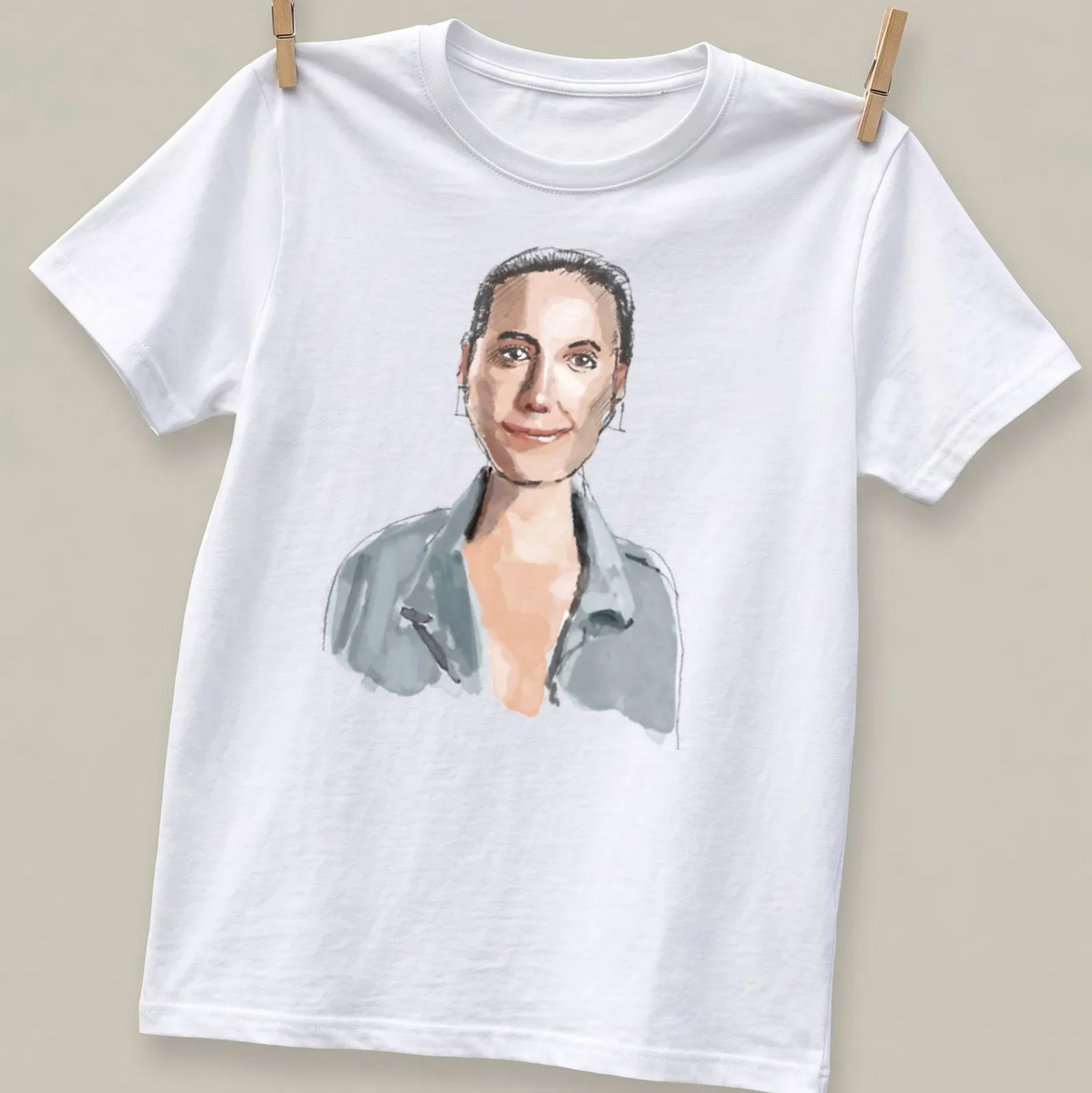 Watercolor illustration of a woman with rectangular earrings in soft colors — printed on a unisex t-shirt