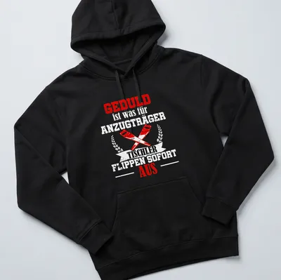 Bold graphic t-shirt featuring crossed saws and GEDULD TISCHLER AUS text — printed on a unisex hoodie