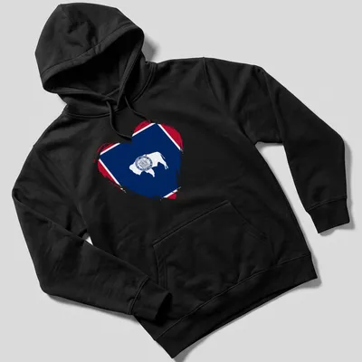 Distressed graphic of a bison inside a heart, inspired by the Wyoming flag — printed on a unisex hoodie