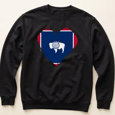 Distressed graphic of a bison inside a heart, inspired by the Wyoming flag — printed on a unisex sweatshirt