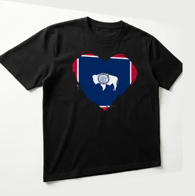 Distressed graphic of a bison inside a heart, inspired by the Wyoming flag — printed on a unisex t-shirt (angled view)